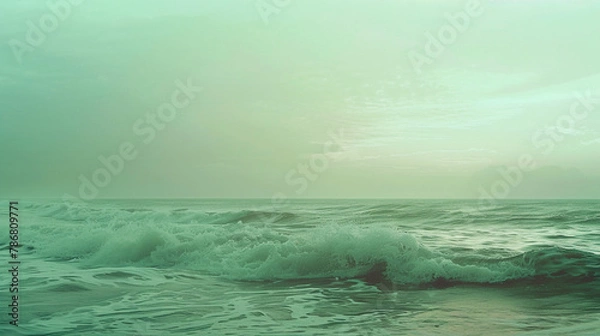 Fototapeta Picture a serene scene where soft green and blush hues blend harmoniously, creating a tranquil atmosphere