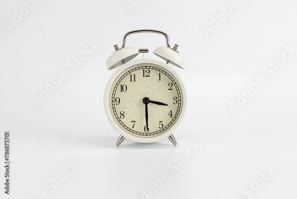 Fototapeta Retro white clock on a white background, the hands show the time at 15:30 or 3:30 AM or 3:30 PM