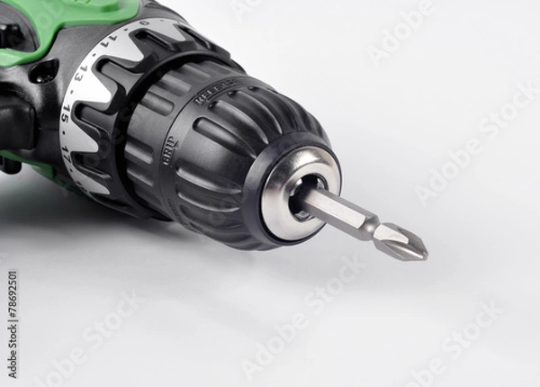 Obraz Электрический шуруповерт на белом фоне