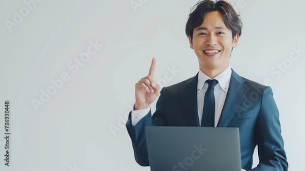 Fototapeta 指差しで提案をするビジネスマン　businessman pointing and giving an advice
