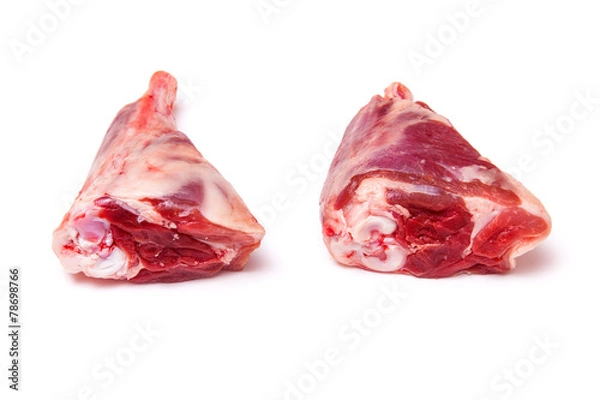 Fototapeta Goat meat shanks isolated on a white studio background.