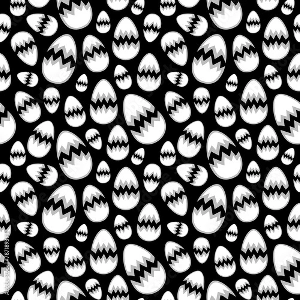 Fototapeta Cracked eggshells in different sizes arranged randomly on a black background. Simple monochrome seamless pattern for printing on different materials or use in graphic design projects.
