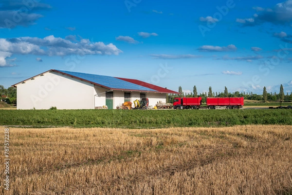 Fototapeta combine harvester in field in Munich