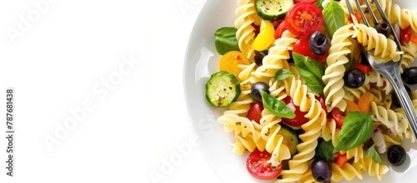 Fototapeta Pasta Salad served with a fork against a white backdrop