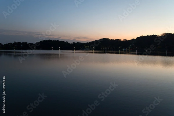 Fototapeta View of the lakeside in the dusk