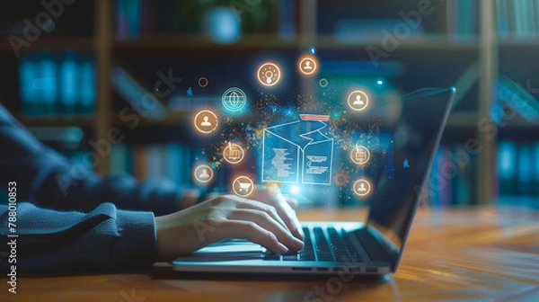 Fototapeta A person is typing on a laptop with a brain on the screen. The laptop is open to a page with a brain image