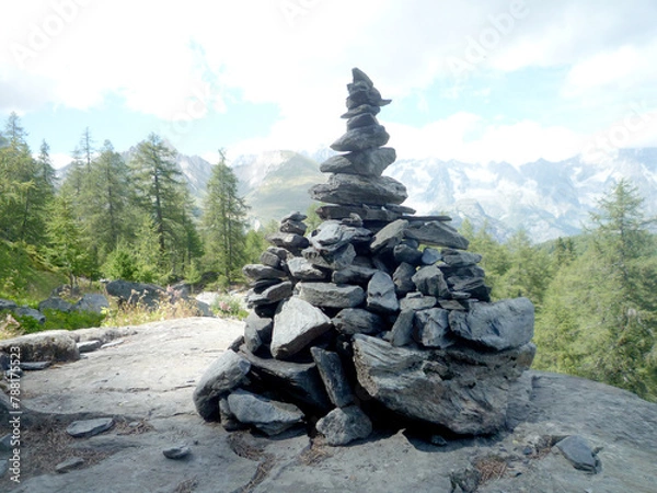 Fototapeta Piled zen stones in a mountain environment with copy space for your text