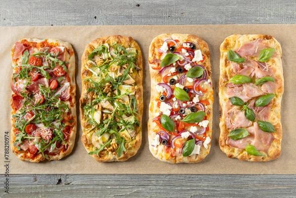 Obraz Traditional pinsa with 4 flavors. View from above. Top view.