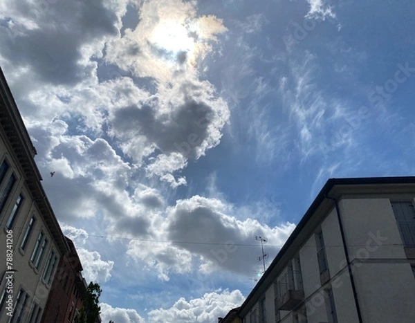 Obraz Clouds in the city sky