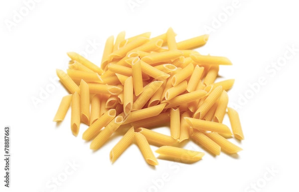 Fototapeta Raw italian penne rigate pasta isolated on white background