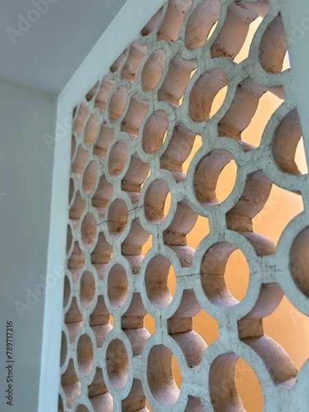 Fototapeta wall with pattern and greenery - travel texture in Cambodia