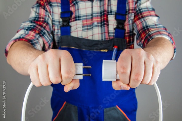 Fototapeta Handwerker Stromkabel