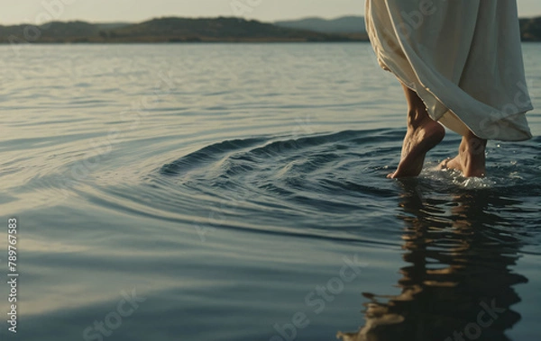 Obraz Jesus walking on water close up of feet walking on sea or ocean	
