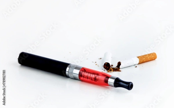 Fototapeta Electronic cigarette and broken cigarette on white background