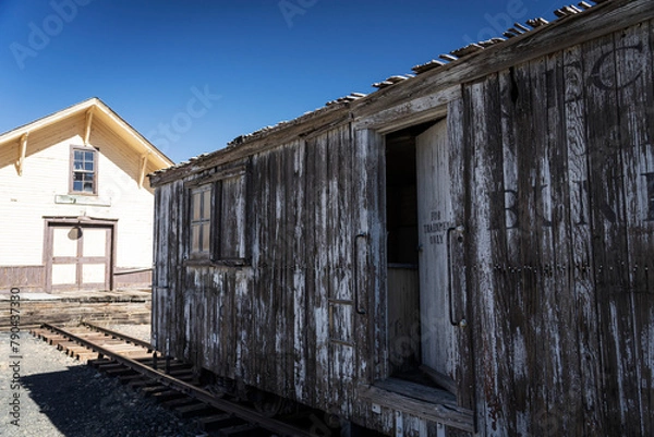 Fototapeta old railway car in a railyard