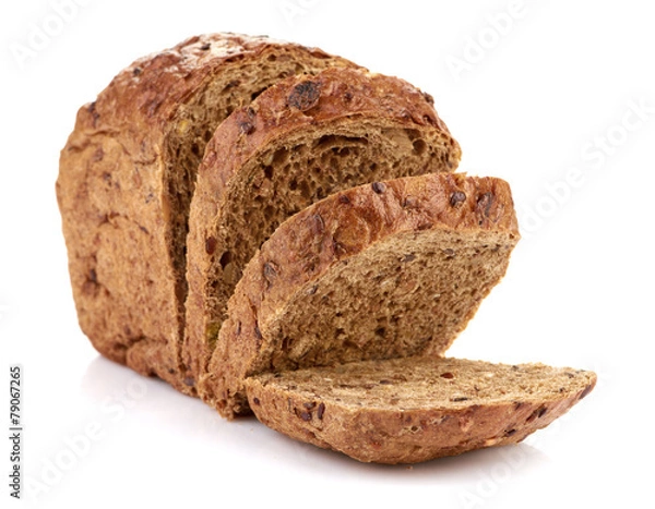 Fototapeta Slices of brown bread on table