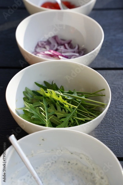 Obraz white bowls with fresh ingredients for a meal