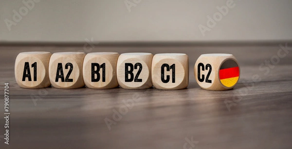 Obraz Cubes, dice or block with different language levels english, french, german, spanish on wodden background