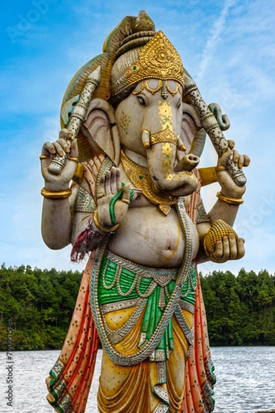 Fototapeta A statue of Ganesha, the elephant-headed Hindu god of prosperity and wisdom in Mauritius, Africa.