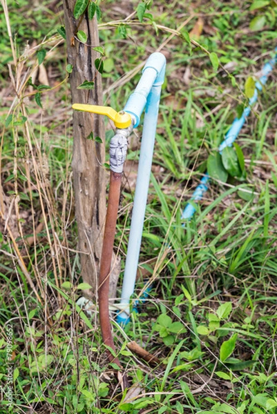 Fototapeta Yellow faucet