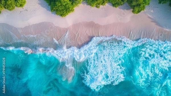 Fototapeta Beautiful beach with turquoise water and waves from above, top view
