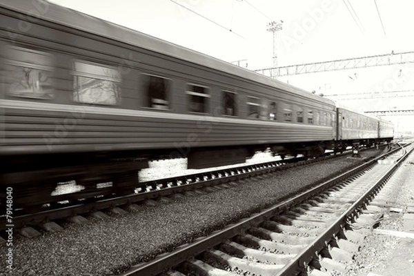 Fototapeta Passenger train passing on speed,