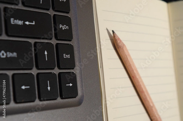 Obraz computer keyboard or notebook, with a red mouse and notepad with pencil, work at home concept