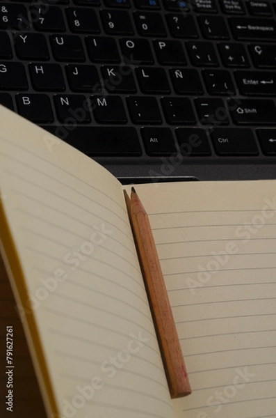 Obraz computer keyboard or notebook, with a red mouse and notepad with pencil, work at home concept