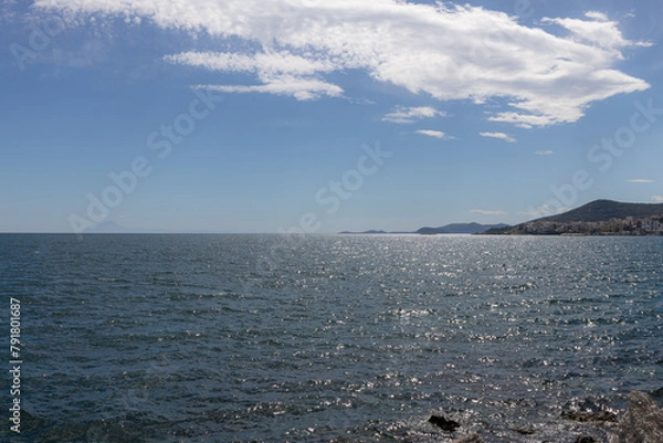 Fototapeta Seascape on a sunny day, blue skies and white clouds on a sunny day. Photo without processing.