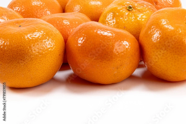 Obraz Multiple mandarin oranges on white background