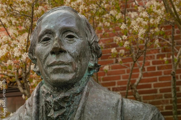 Fototapeta Bronze statue of H C Andersen on a cobbled street
