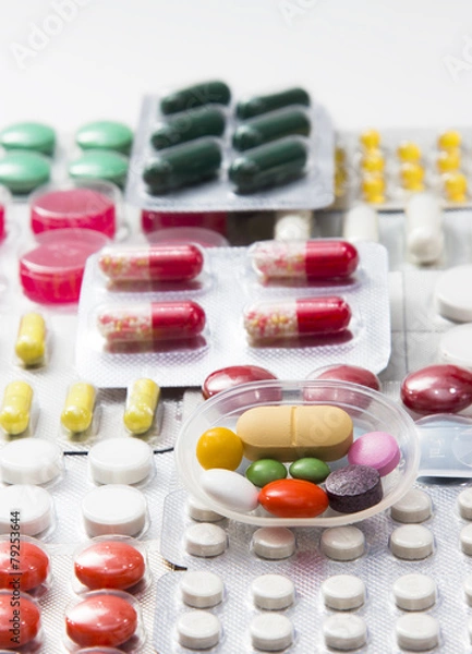 Fototapeta tablets, capsules in blisters on the white background