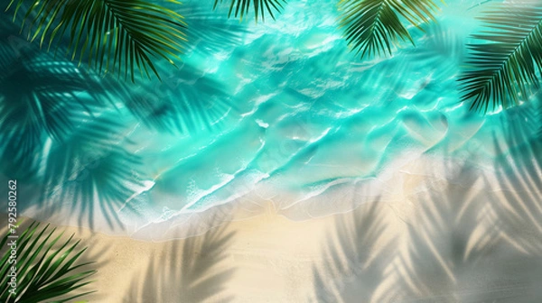 Fototapeta Aerial view of a tropical beach with clear turquoise waters and palm leaves shadows.