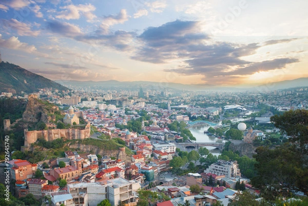 Fototapeta Landscape of old Tbilisi on the background of spectacular blue sky with clouds