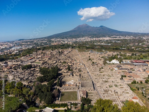 Fototapeta Pompei, Itay: Aerial view of the famous Pompeii archaeological old city by the Vesuve volcano in Napoly, or Naples, in Italy on a sunny day.