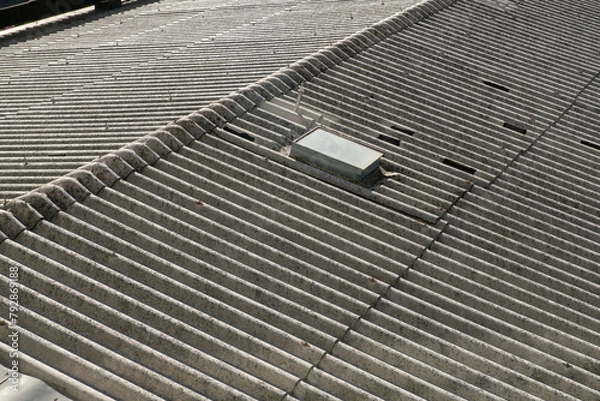 Fototapeta Cement corrugated roof, similar to asbestos with asbestos inside. the verification of materials is important for any works.