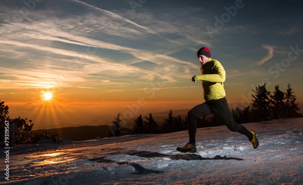 Obraz Fast running man in sunset