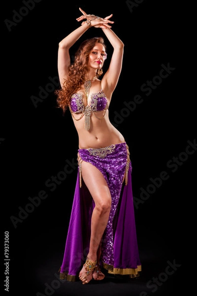Fototapeta Beautiful belly dancer  in standing pose