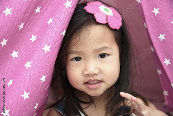 Obraz Female toddler portrait with pink fabric