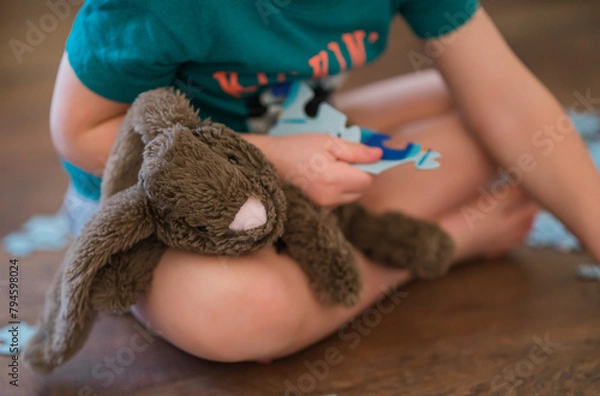 Obraz child playing with toy
