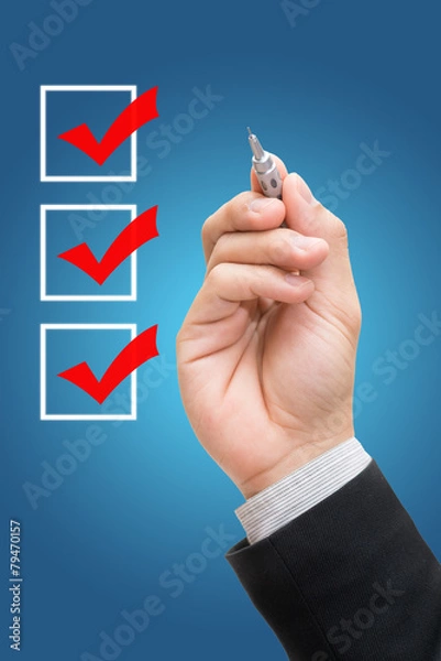 Fototapeta Businessman checking mark checklist marker Isolated