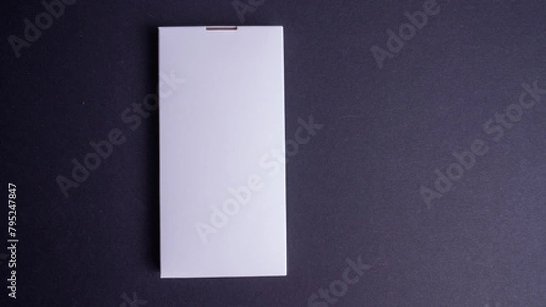 Obraz white cardboard packaging on a black background