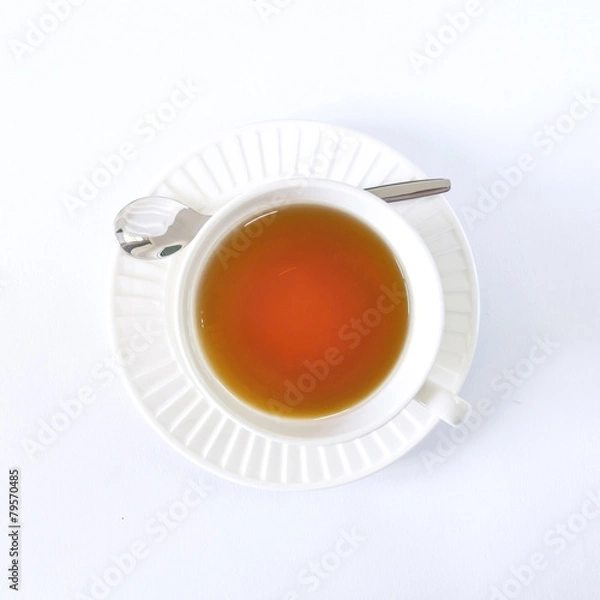Fototapeta The white cup tea on the white background