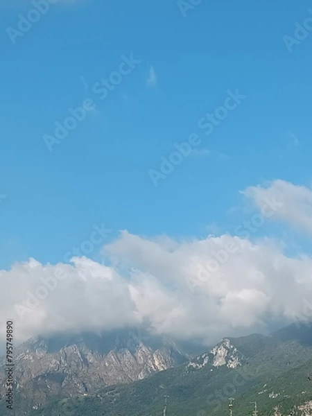 Fototapeta clouds over the mountain