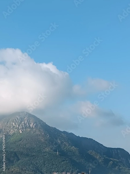 Fototapeta clouds over the mountains