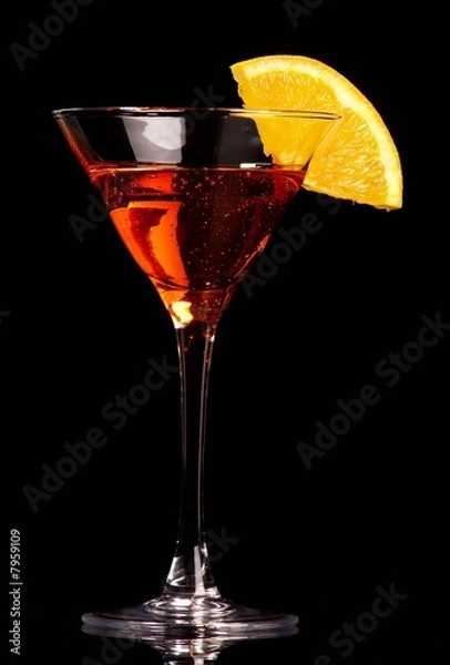Obraz  Orange cocktail on black background