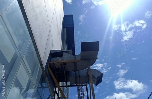Fototapeta Exhaust fan in the  building with sky