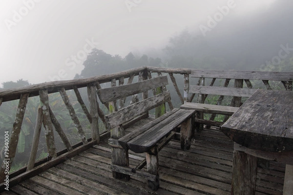 Fototapeta The relax platform and view of valley and the mist