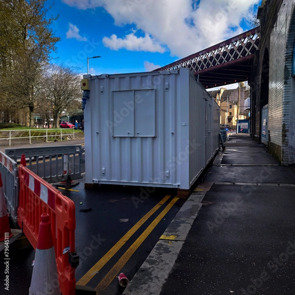 Fototapeta A white steel container box used as an office