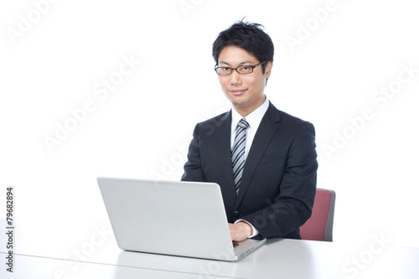 Fototapeta パソコンで仕事／ビジネスマン